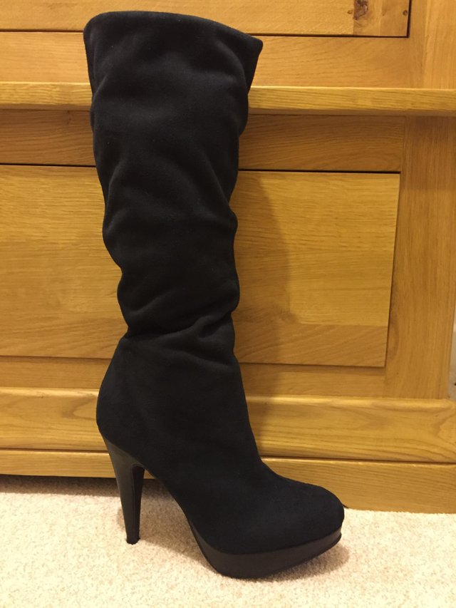 Preview of the first image of Black Boots - Size UK 5.