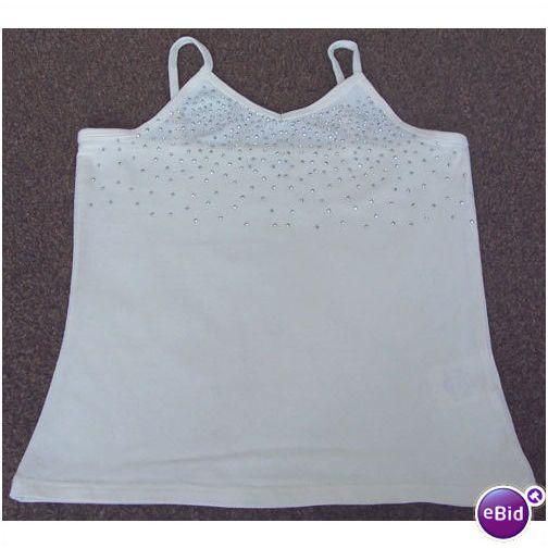 Preview of the first image of PRETTY GIRLS CREAM SUMMER TOP WITH GLITTER DETAIL 8/9 YRS.