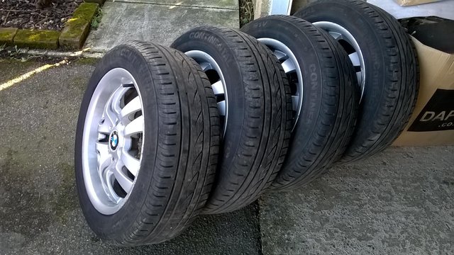 Image 2 of bmw alloys each with nearly new continental tyres