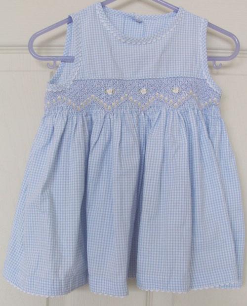 Preview of the first image of PRETTY GIRLS BLUE CHECK DRESS BY MARKS & SPENCER - AGE 3/6 M.