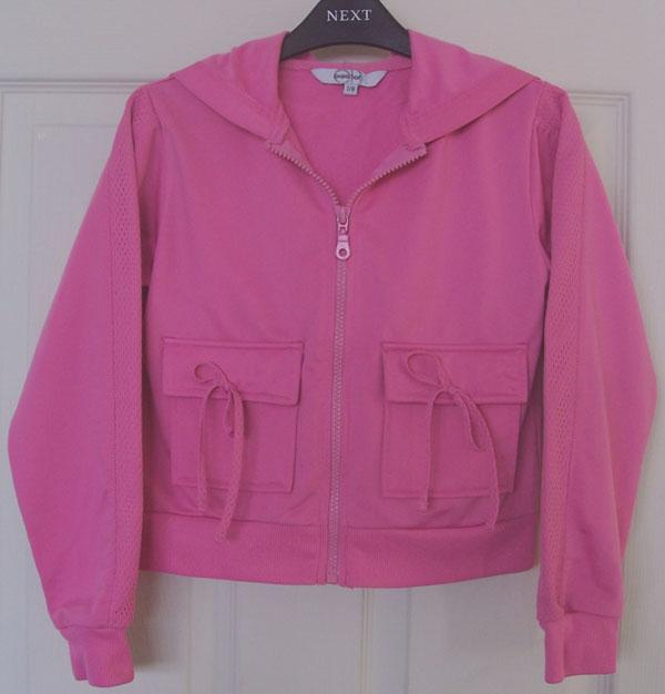 Preview of the first image of PRETTY GIRLS BRIGHT PINK HOODED ZIP UP TOP - AGE 7/8 YRS.