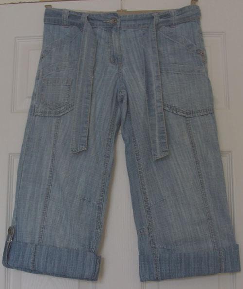 Preview of the first image of PRETTY GIRLS DENIM CROP JEANS BY NEXT - AGE 10 YRS.