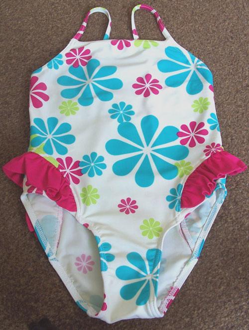Preview of the first image of PRETTY GIRLS FLOWERED SWIMSUIT - AGE 5/6 YRS.