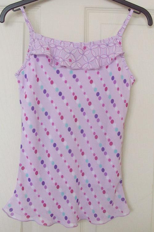 Preview of the first image of PRETTY GIRLS LILAC SKIRT & TOP SET BY F & F - AGE 8/9 YRS.
