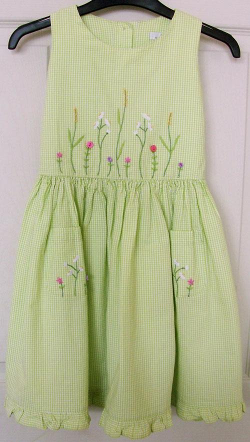 Preview of the first image of PRETTY GIRLS LIME GREEN EMBROIDERED DRESS BY M&S - AGE 5 YRS.