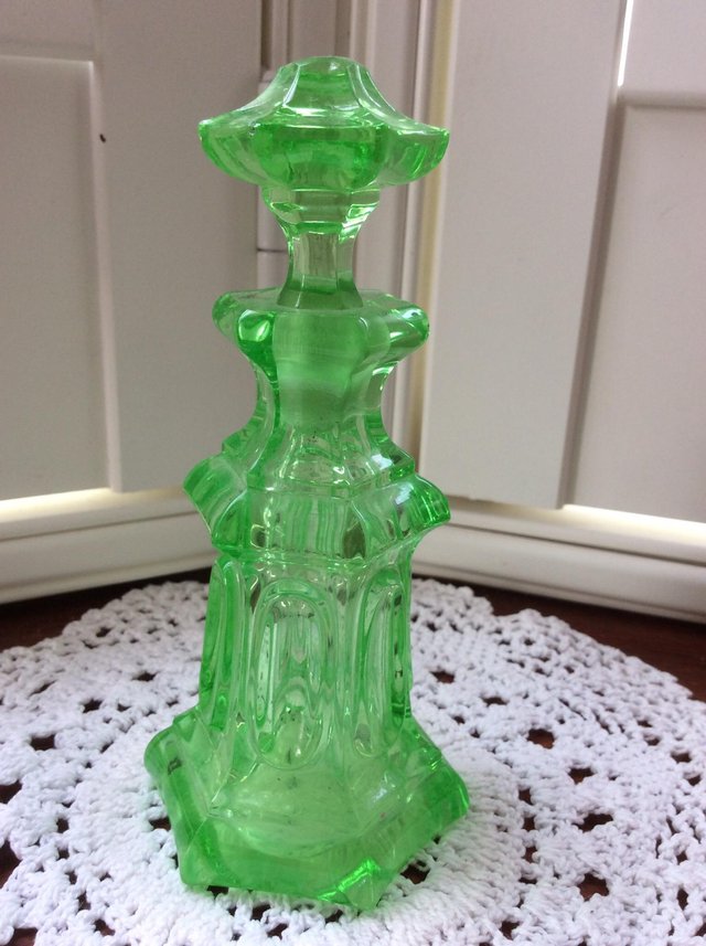 Preview of the first image of Vintage green glass perfume bottle.