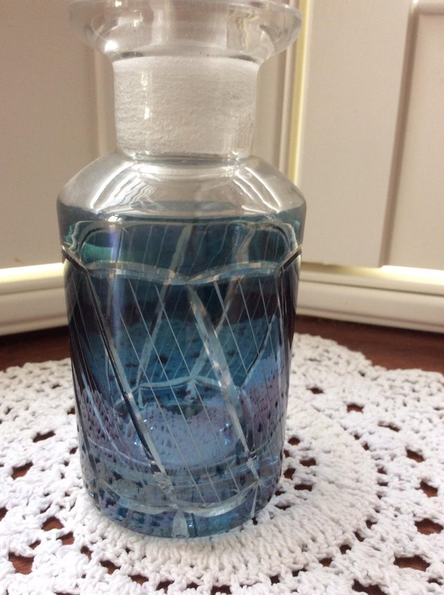 Preview of the first image of Clear and blue glass perfume/ scent bottle.
