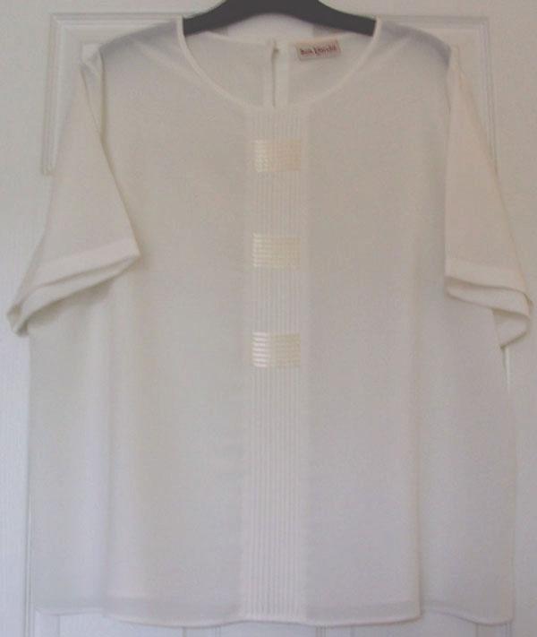 Preview of the first image of PRETTY LADIES SHORT SLEEVE CREAM BLOUSE BY BON MARCHE.