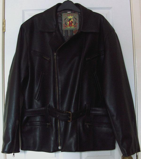Preview of the first image of LADIES BLACK LEATHER LOOK JACKET WITH BELT DETAIL - SZ XL.