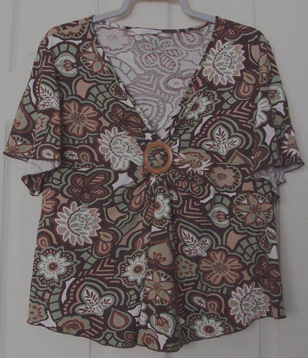 Preview of the first image of PRETTY LADIES FLOWERED TOP BY NEW LOOK - SZ 22.