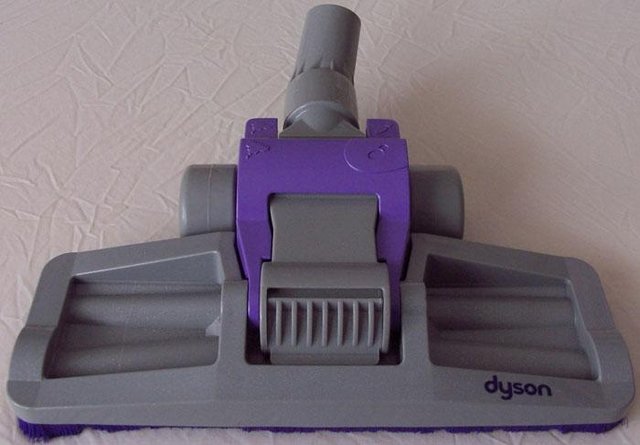 Preview of the first image of Genuine Dyson DC05 Purple/Grey Floor Head   BX1.