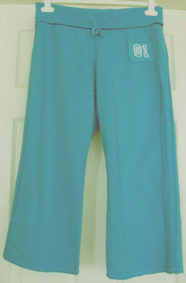 Preview of the first image of LADIES TURQUOISE CROPPED TROUSERS BY NEXT - SZ 12.