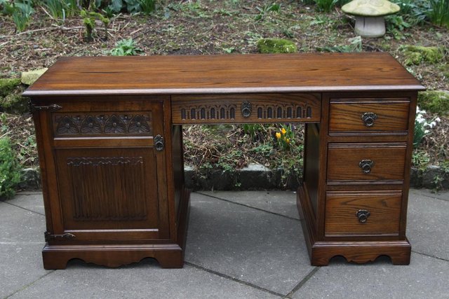 Preview of the first image of AN OLD CHARM LIGHT OAK WRITING TABLE COMPUTER DESK CABINET.