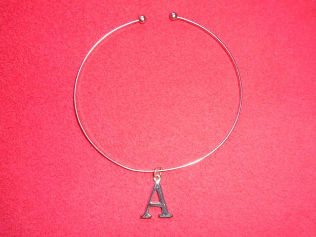 Preview of the first image of 1970s necklace with the letter "A".