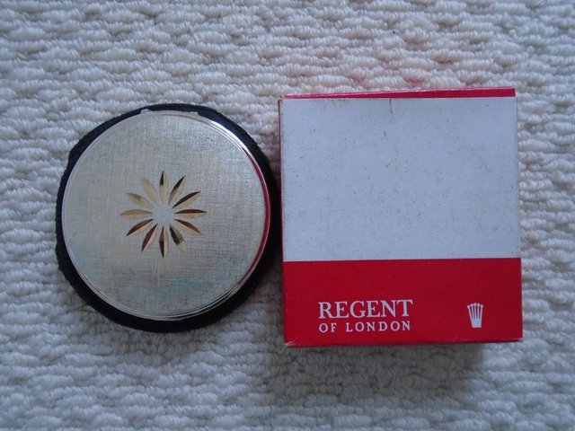 Preview of the first image of Vintage 1970s Regent of London silver compact.