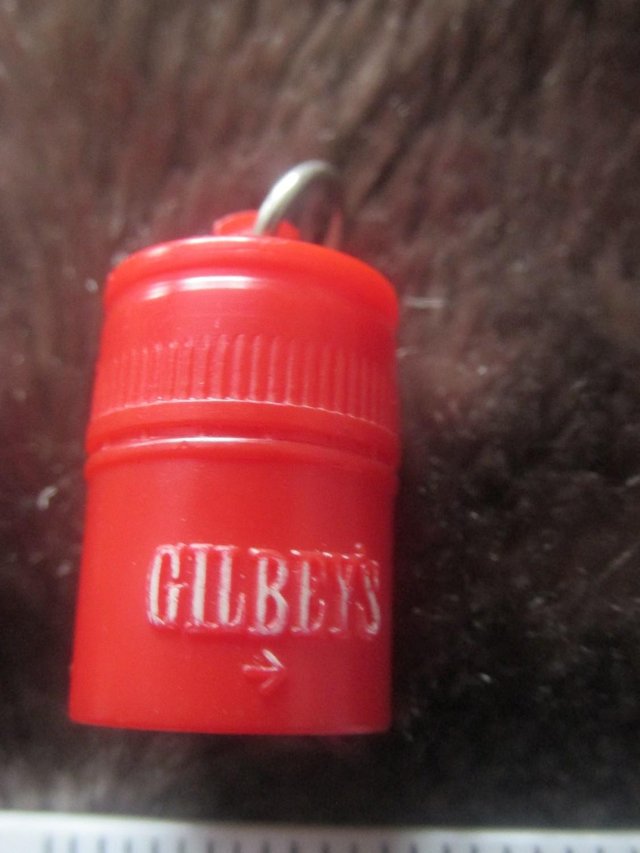 Preview of the first image of small gilbeys gin charm??.