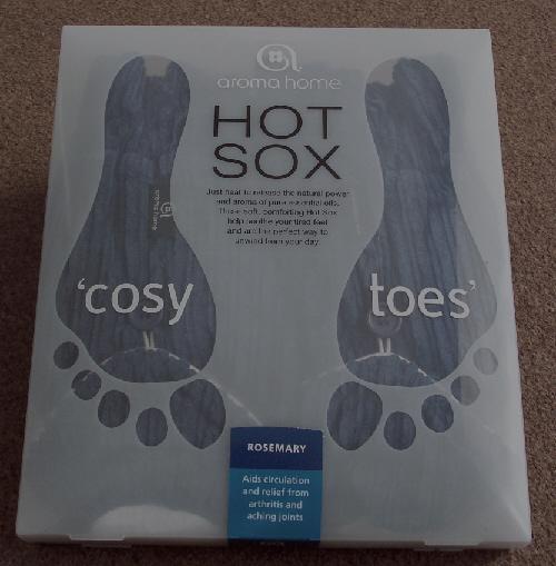 Preview of the first image of Aroma Home Microwaveable Navy Feet Warmers - New In Box.