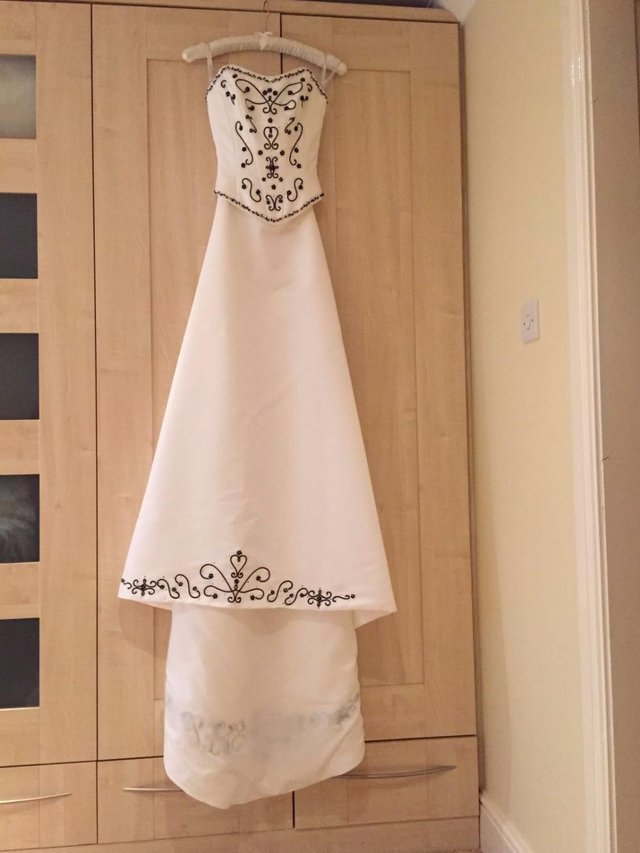 Image 2 of WEDDING DRESS (WHITE WITH BLACK DETAILING) AND UINDERSKIRT