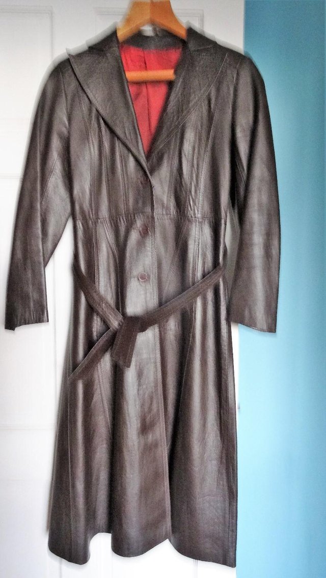 Preview of the first image of Brown leather long coat.