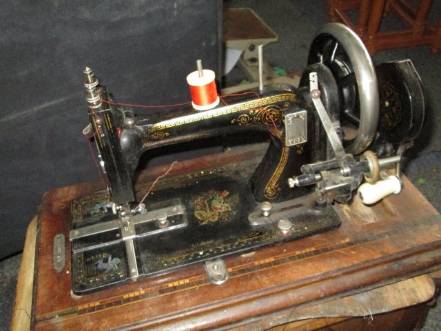 Image 3 of Bradbury Soeze hand crank sewing machine.