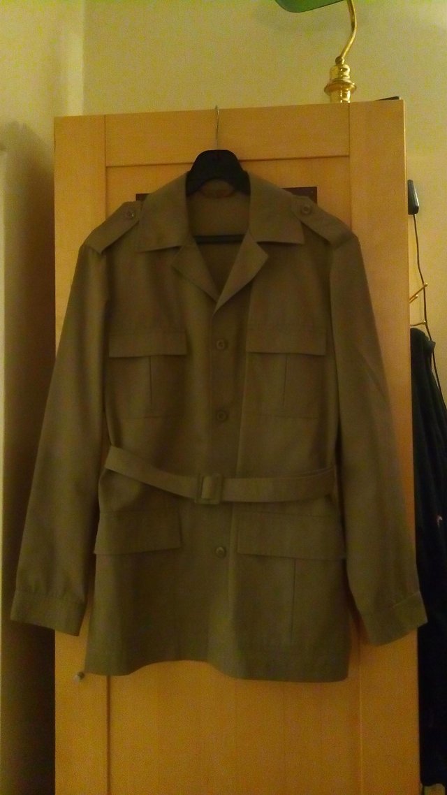 Preview of the first image of Olive green army jacket.