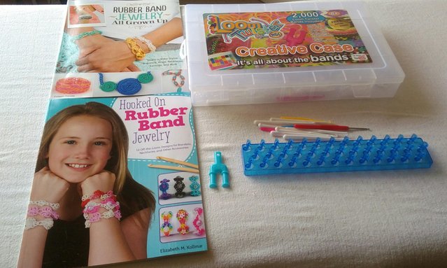 Preview of the first image of Loomis Rubber Bands plus books, case and accessories.