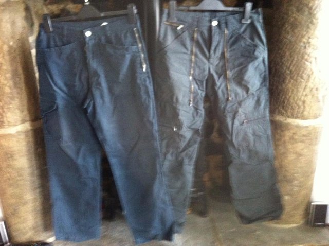 Preview of the first image of 2 pair of mens designer cargo pants.