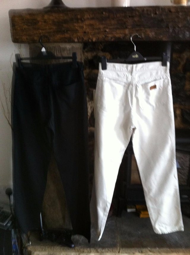 Preview of the first image of 1 pair left : black designer  casual pants by Tom Wolfe....