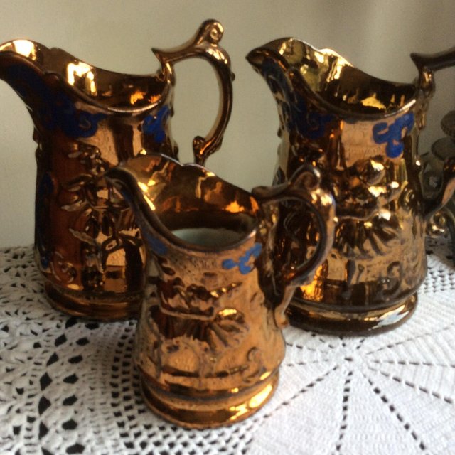 Preview of the first image of Set of antique lustre vases.