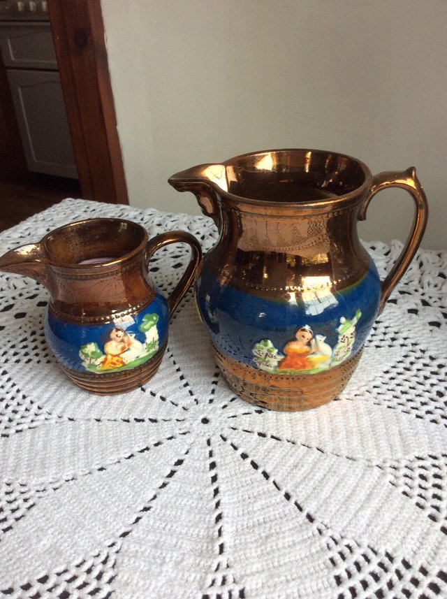 Image 2 of Two copper lustre jugs