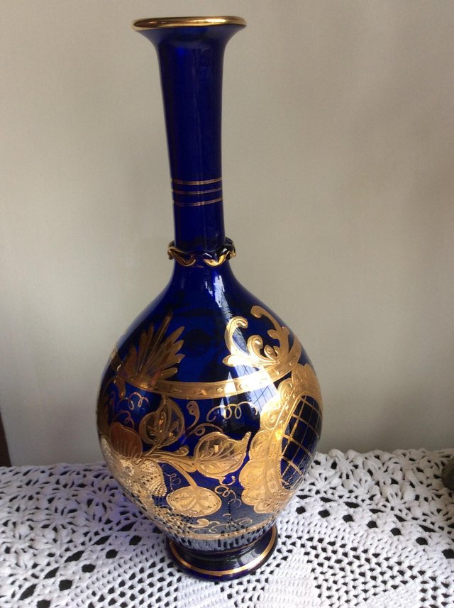 Preview of the first image of Blue and gold glass vase.