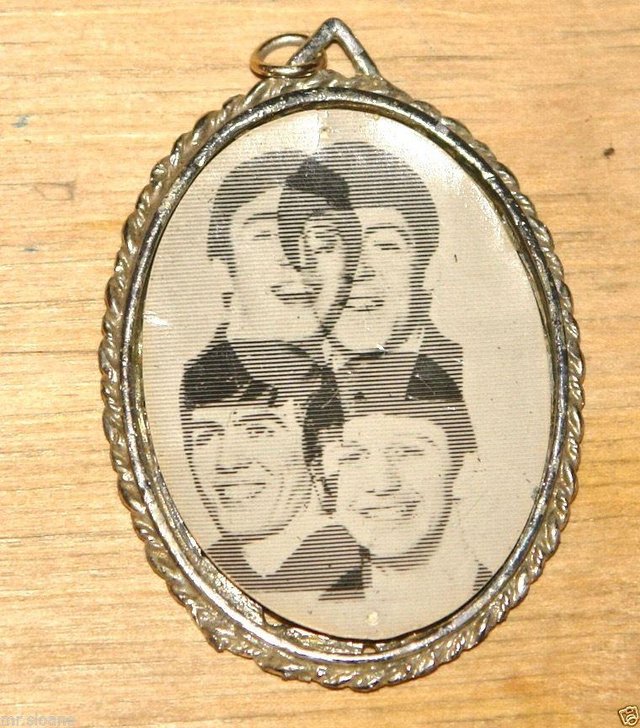 Preview of the first image of ORIGINAL BEATLES 1963/1964 JEWELLERY CHARM/PENDANT/MEDALLION.