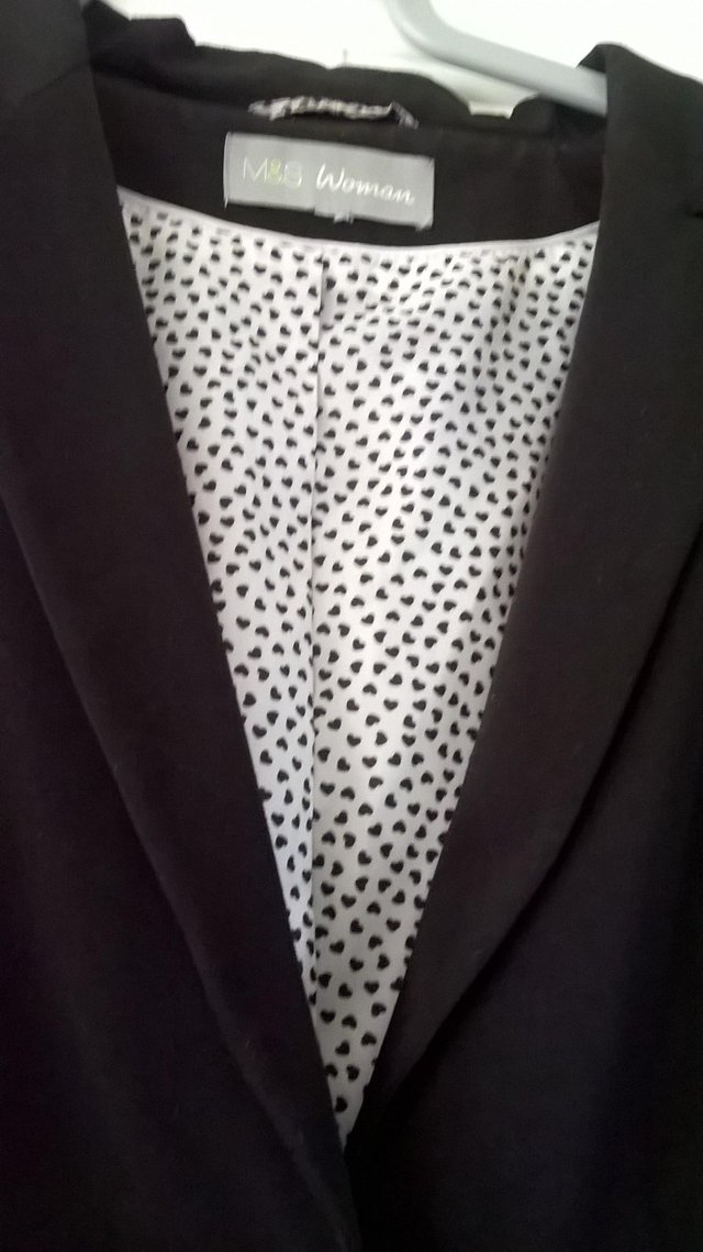 Preview of the first image of Hardly worn M&S Ladies black jacket size 24.