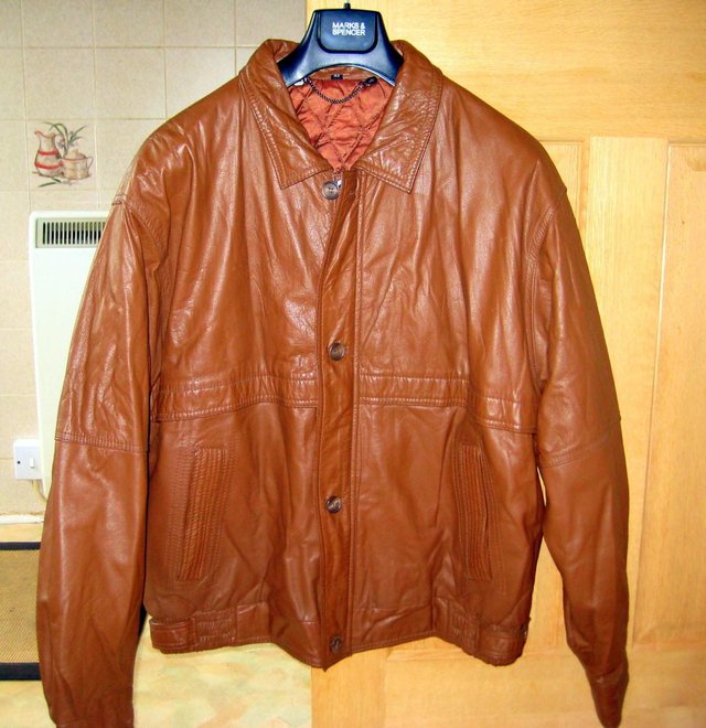 Preview of the first image of Brown leather jacket, hardly worn..