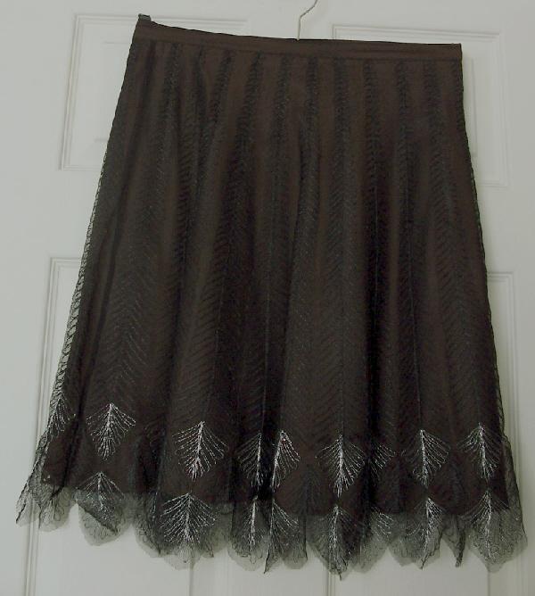 Preview of the first image of Pretty Ladies Brown/Black Skirt By French Connection - Sz 8.