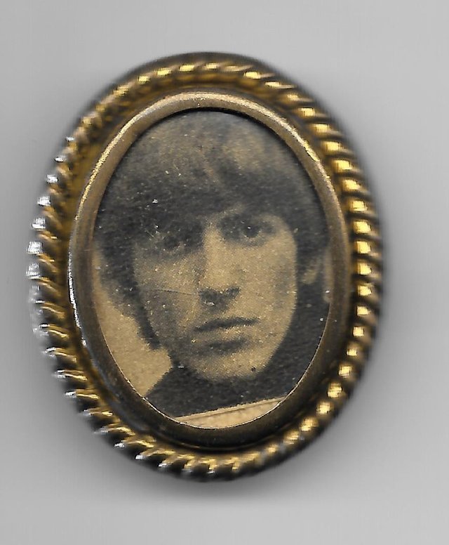 Preview of the first image of ORIGINAL BEATLES GEORGE HARRISON 1960'S VINTAGE METAL BRASS.