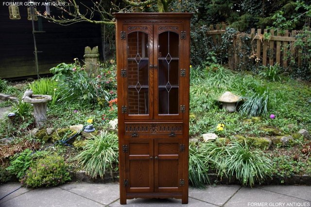 Preview of the first image of OLD CHARM JAYCEE LIGHT OAK CORNER DISPLAY CABINET CUPBOARD.