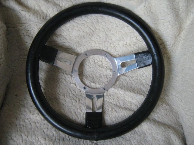 Preview of the first image of LEATHER STEERING WHEEL & STEERING WHEEL COVERS from.