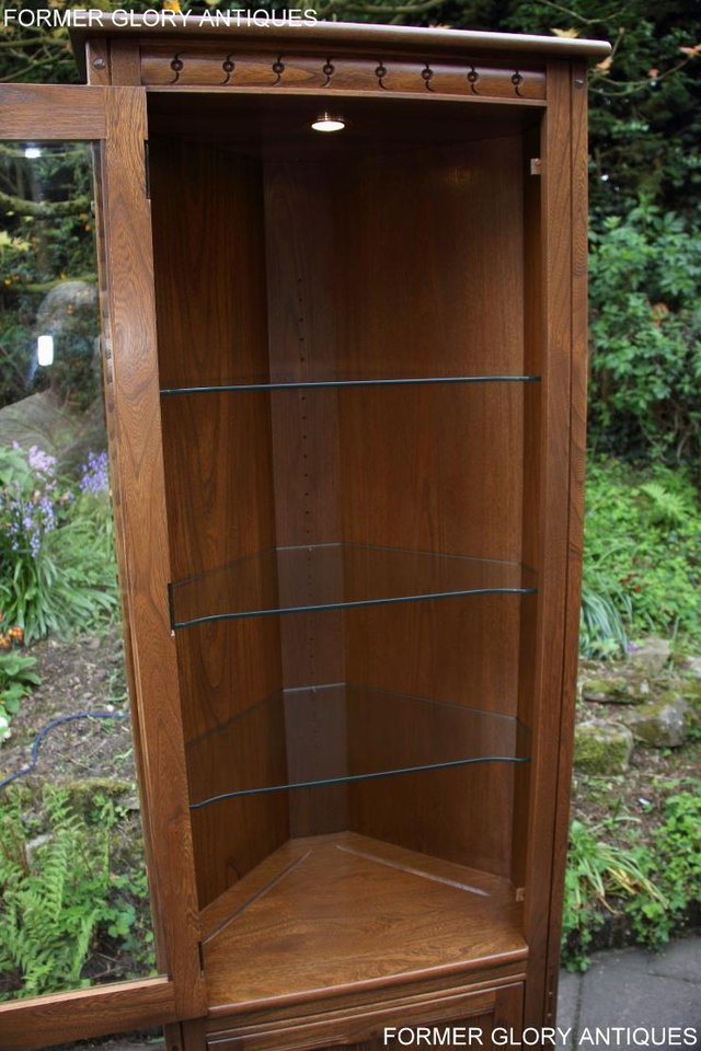 Image 41 of AN ERCOL GOLDEN DAWN CORNER DISPLAY CABINET CUPBOARD STAND