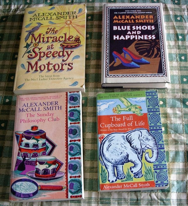 Preview of the first image of collection of 4 Alexander McCall Smith books.