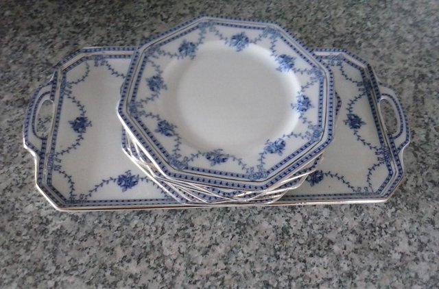 Preview of the first image of A set of six sandwich or cake plates and a serving tray..