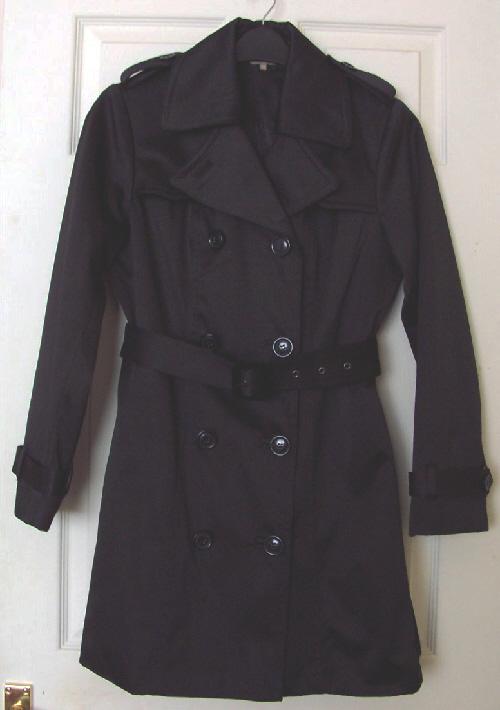 Preview of the first image of Beautiful Ladies Black Coat By M&Co Boutique - Sz 12  B22.