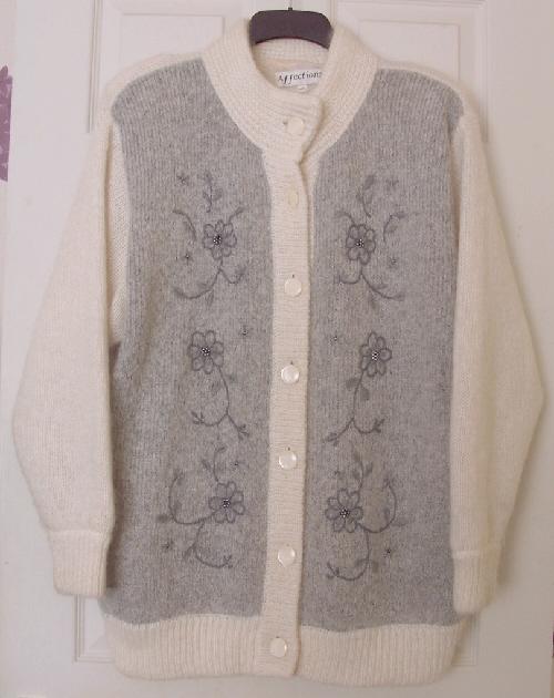 Preview of the first image of Ladies Knitted Grey And Cream Cardigan - Size M/L.