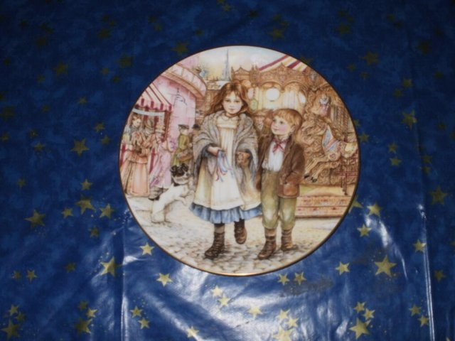 Preview of the first image of Royal Worcester ~Fairground Magic' ~  NSPCC Christmas Plate.