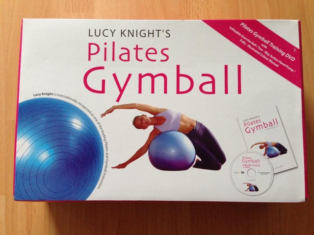 Preview of the first image of Pilates Gymball & DVD unopened in box.
