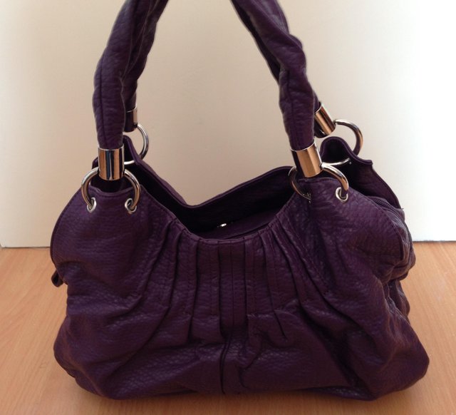 Preview of the first image of Next Purple Handbag in good condition.