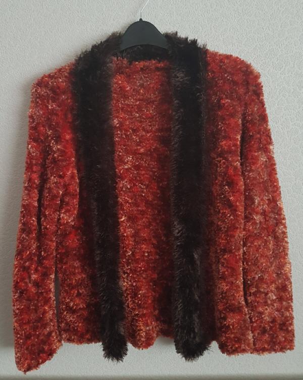 Preview of the first image of Gorgeous Handknitted Burnt Orange Bobble Jacket.  B3.