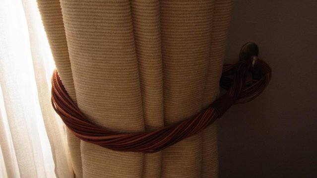 Preview of the first image of Pair Tiebacks tan & terracotta coloured tieback for curtains.