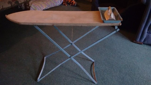 Preview of the first image of Vintage Triang Ironing Board with Iron.