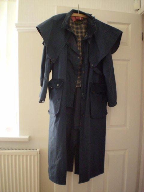 Preview of the first image of CHAMPION LONG RIDING COAT MEDIUM -NAVY.